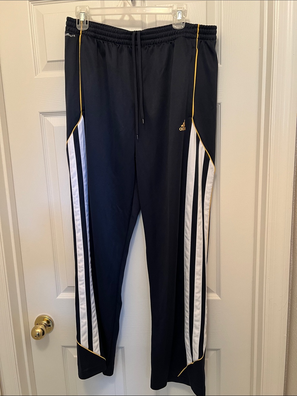 adidas Black Track Pants with White Stripes and Gold Trim